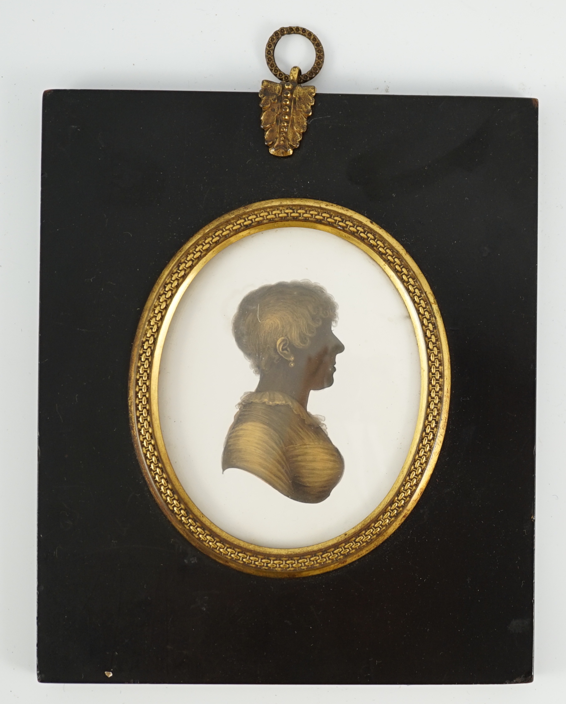 John Miers (1752-1821), Silhouette of the Countess of Clarendon, painted and bronzed plaster, 8 x 6.5cm.